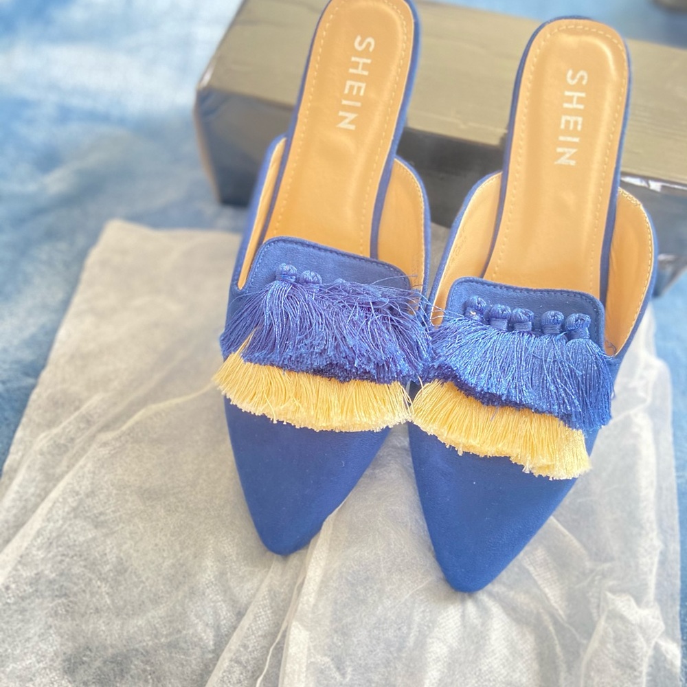 Blue slides. Size 41. Never worn.